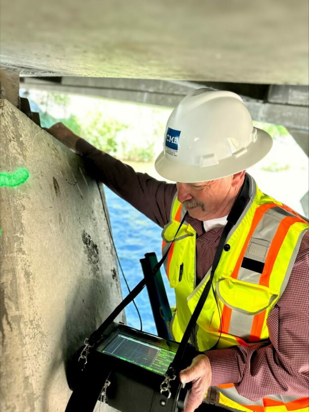 06-2024_2998_ts_upload David Russell performing ultrasonic testing on the Greg Street Bridge