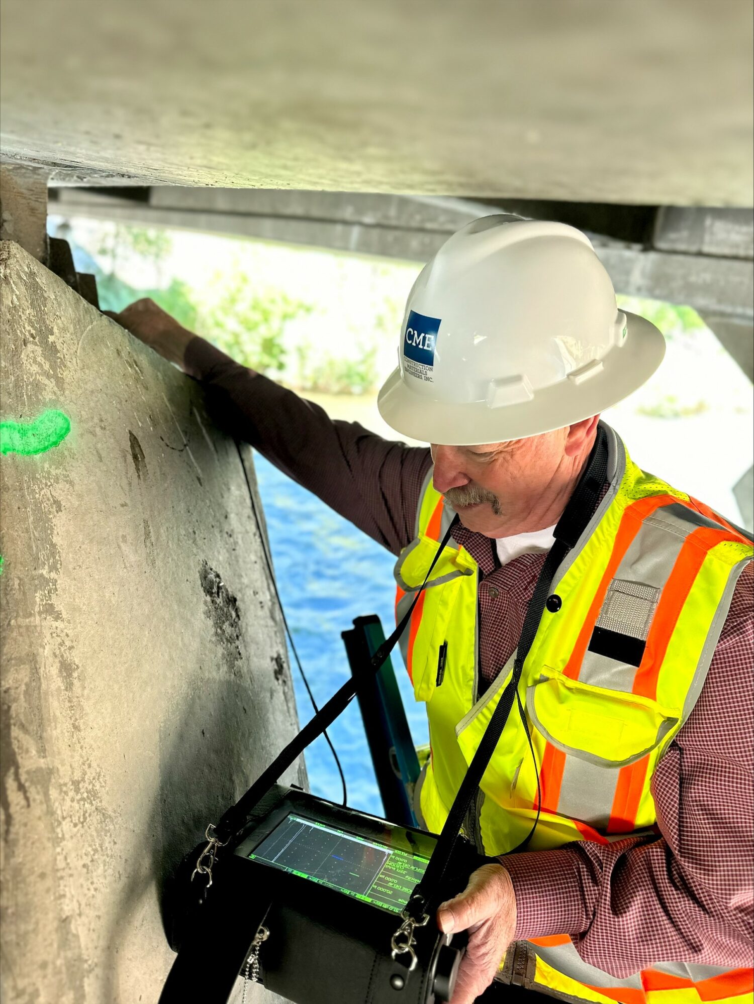 06-2024_2998_ts_upload David Russell performing ultrasonic testing on the Greg Street Bridge